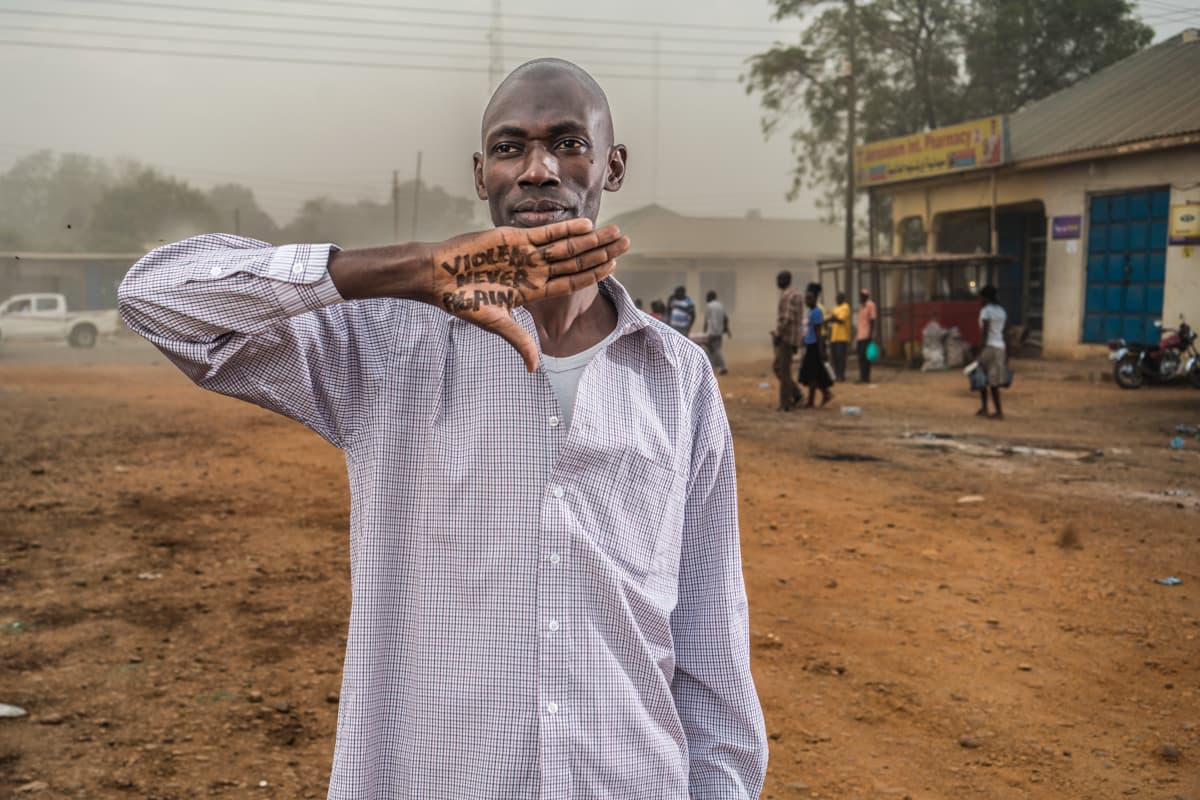 Brain Tattoo portrait with the message Violence Never Again, South Sudan