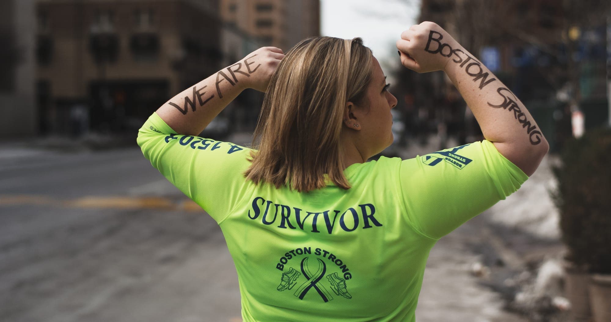 Allison Elliot - Dear World portrait at the Boston Marathon finish line