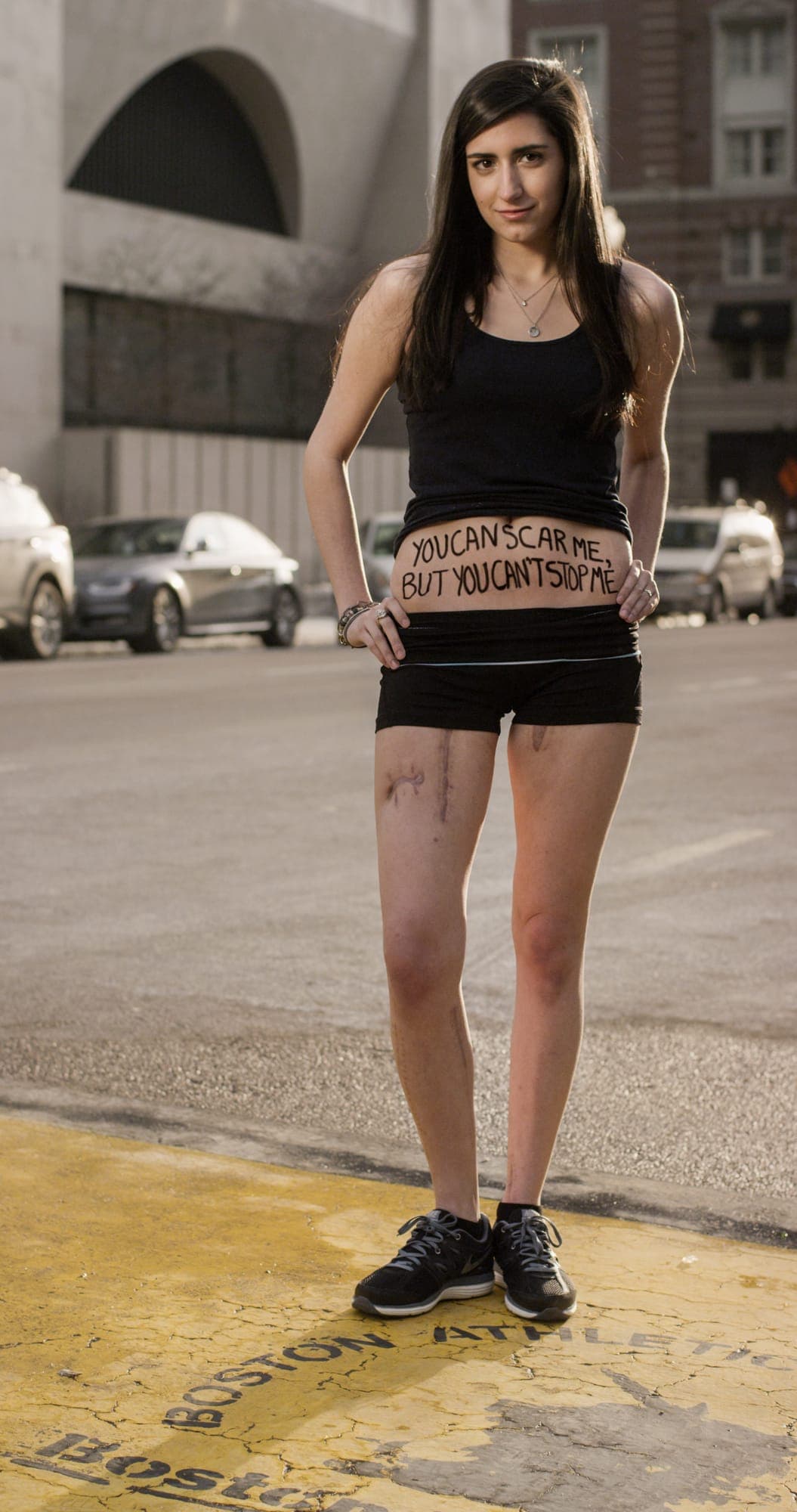 Sydney Corcoran - Dear World portrait at the Boston Marathon finish line